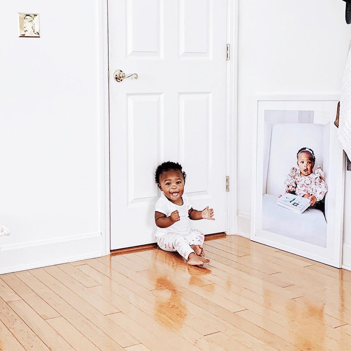 baby next to Artifact Uprising Gallery Frame created by @loree.1