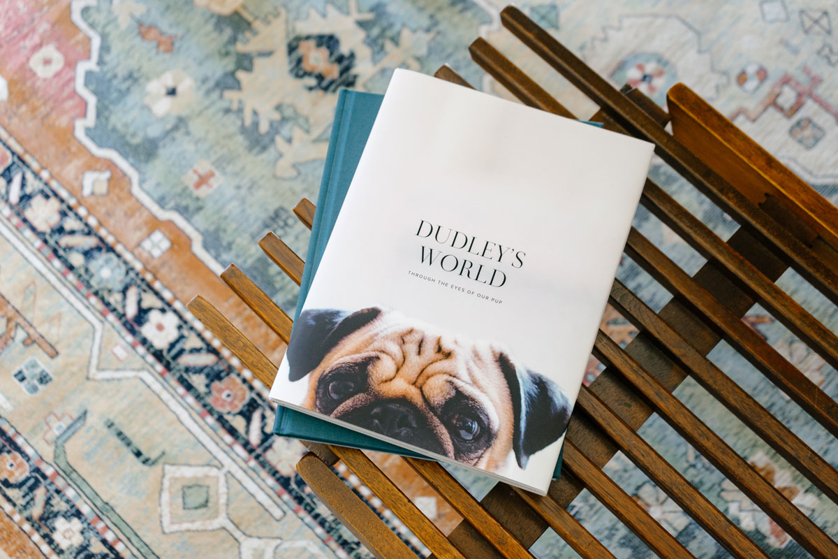 photo book titled Dudley's Word with pug on the cover