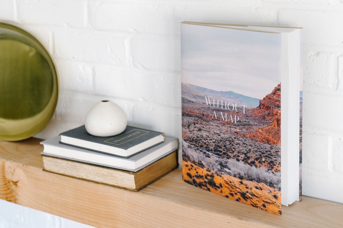 Colorful photo of red rock formations on cover of photo book