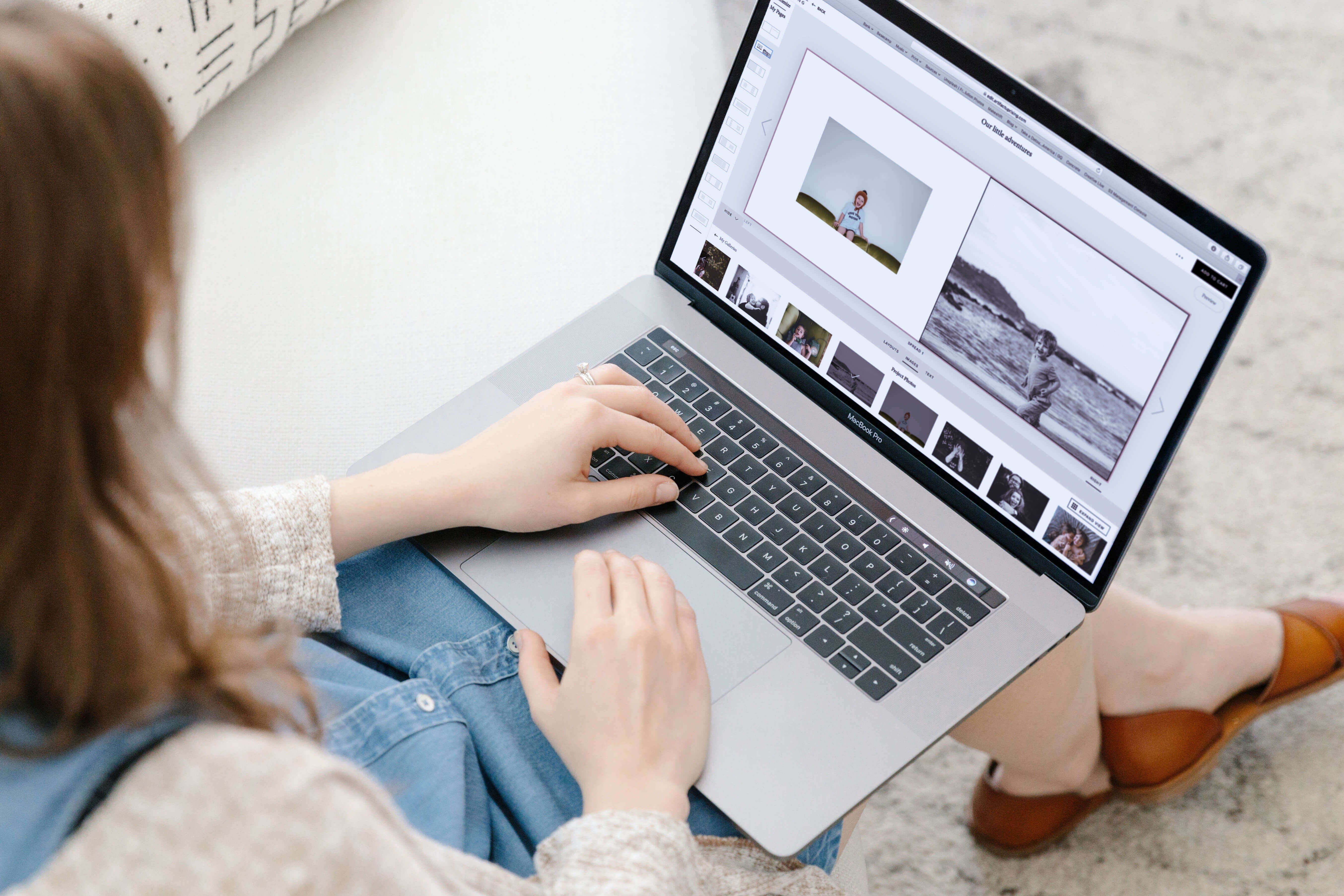 woman building photo book online