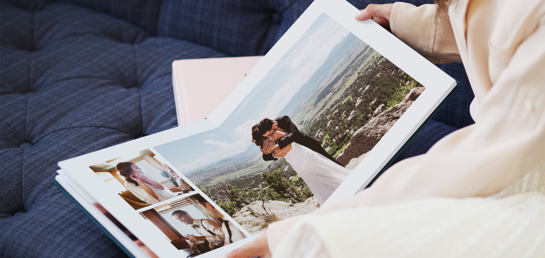 hands holding opened wedding album full of photo book layout ideas