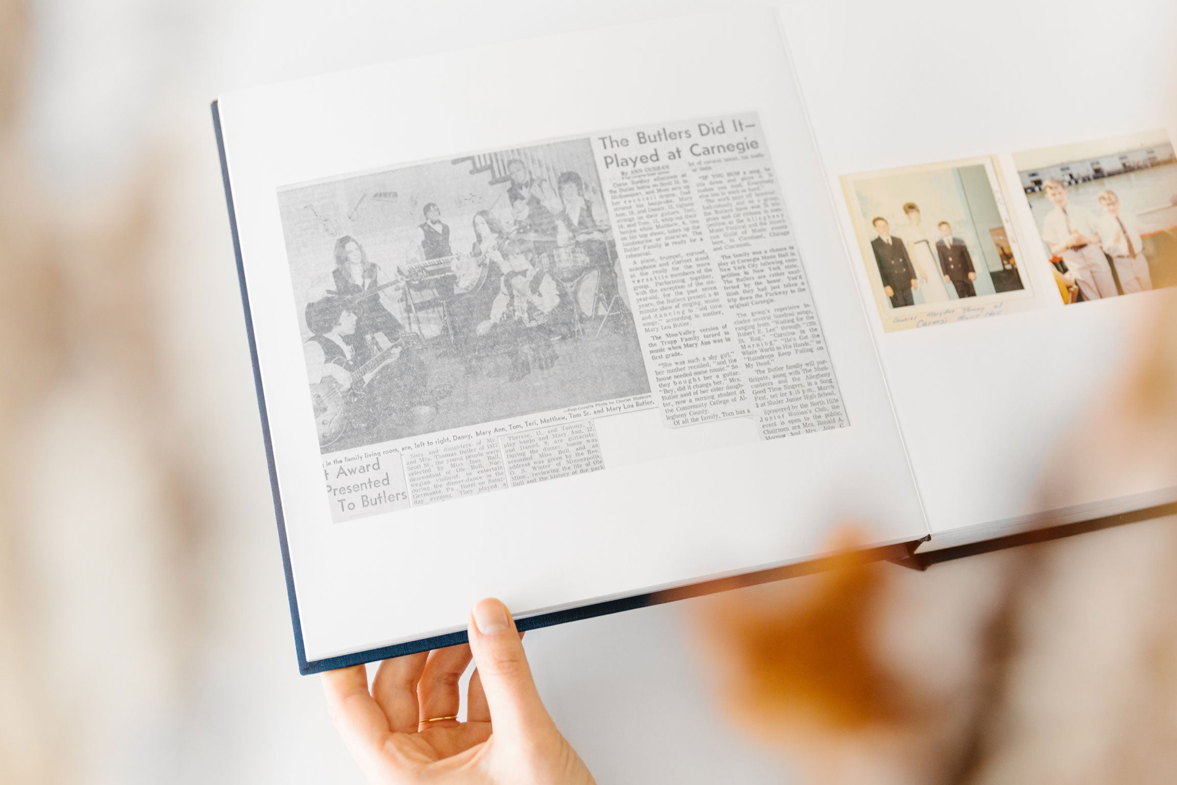 Family history album with newspaper clipping