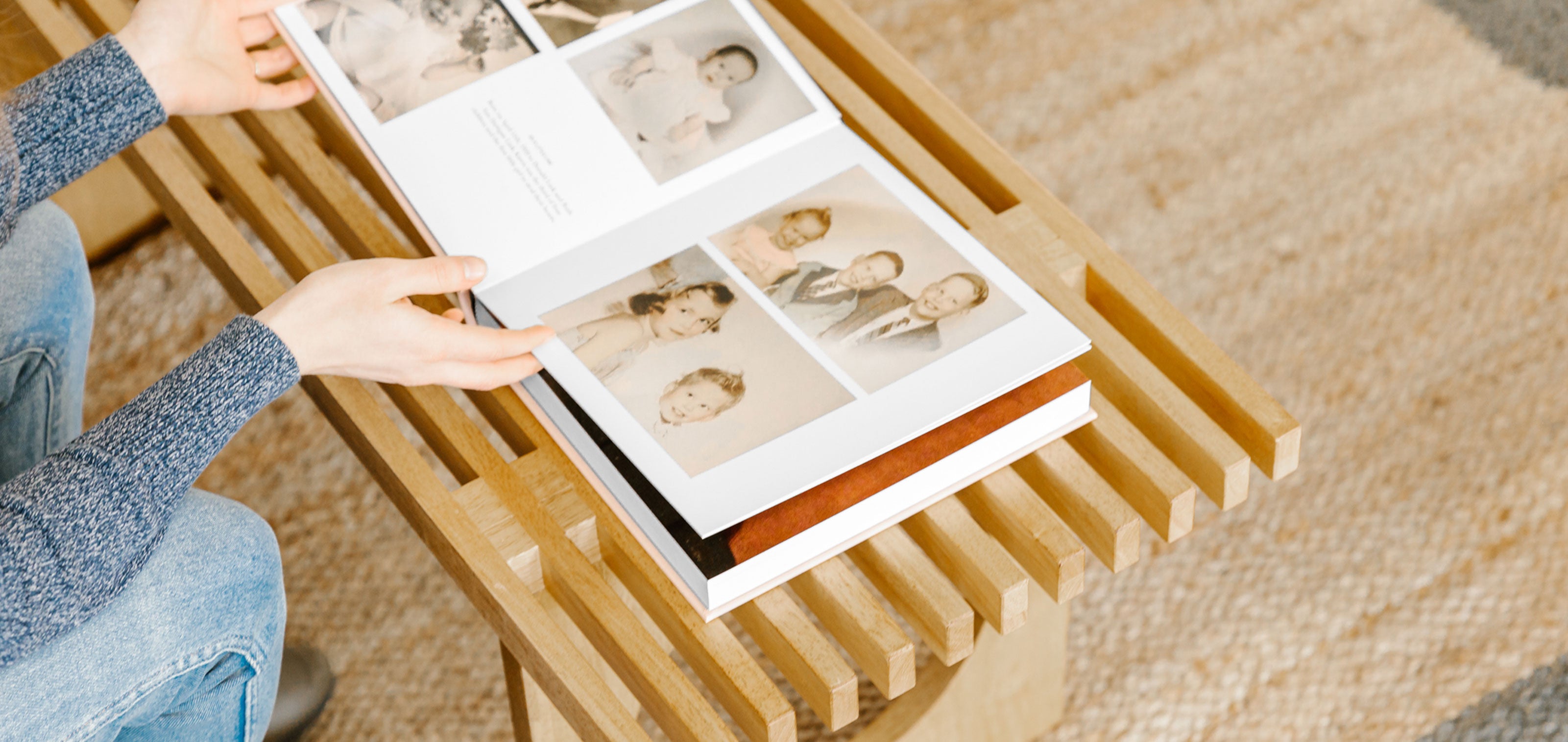 woman looking through family history book