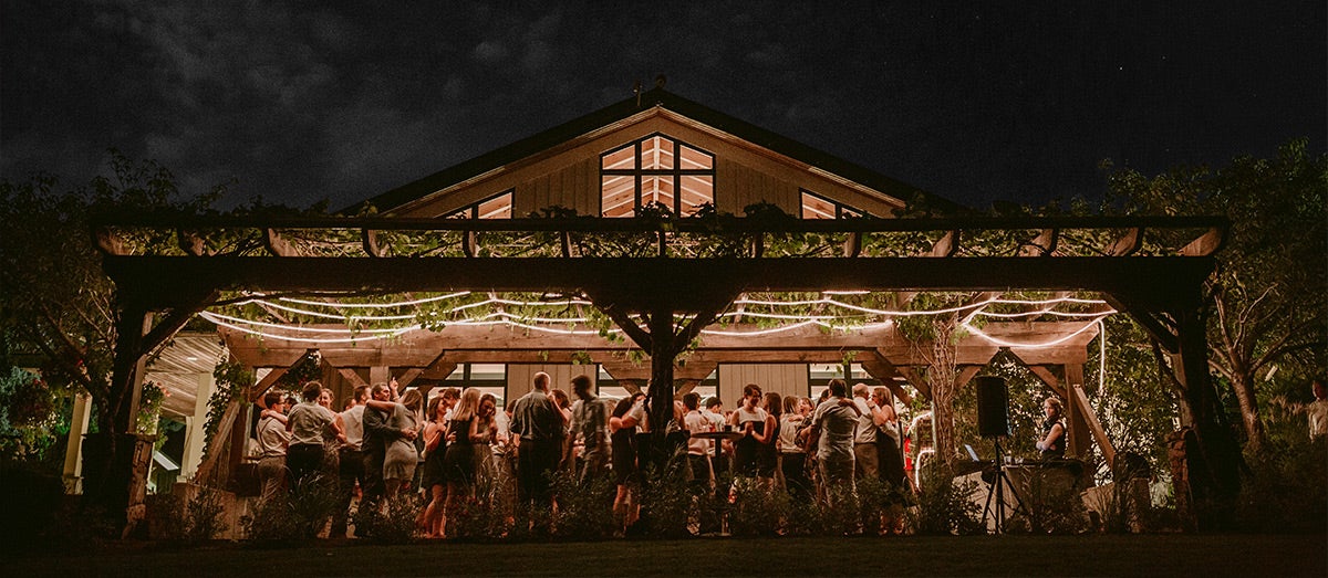 Crowded dance floor at wedding reception