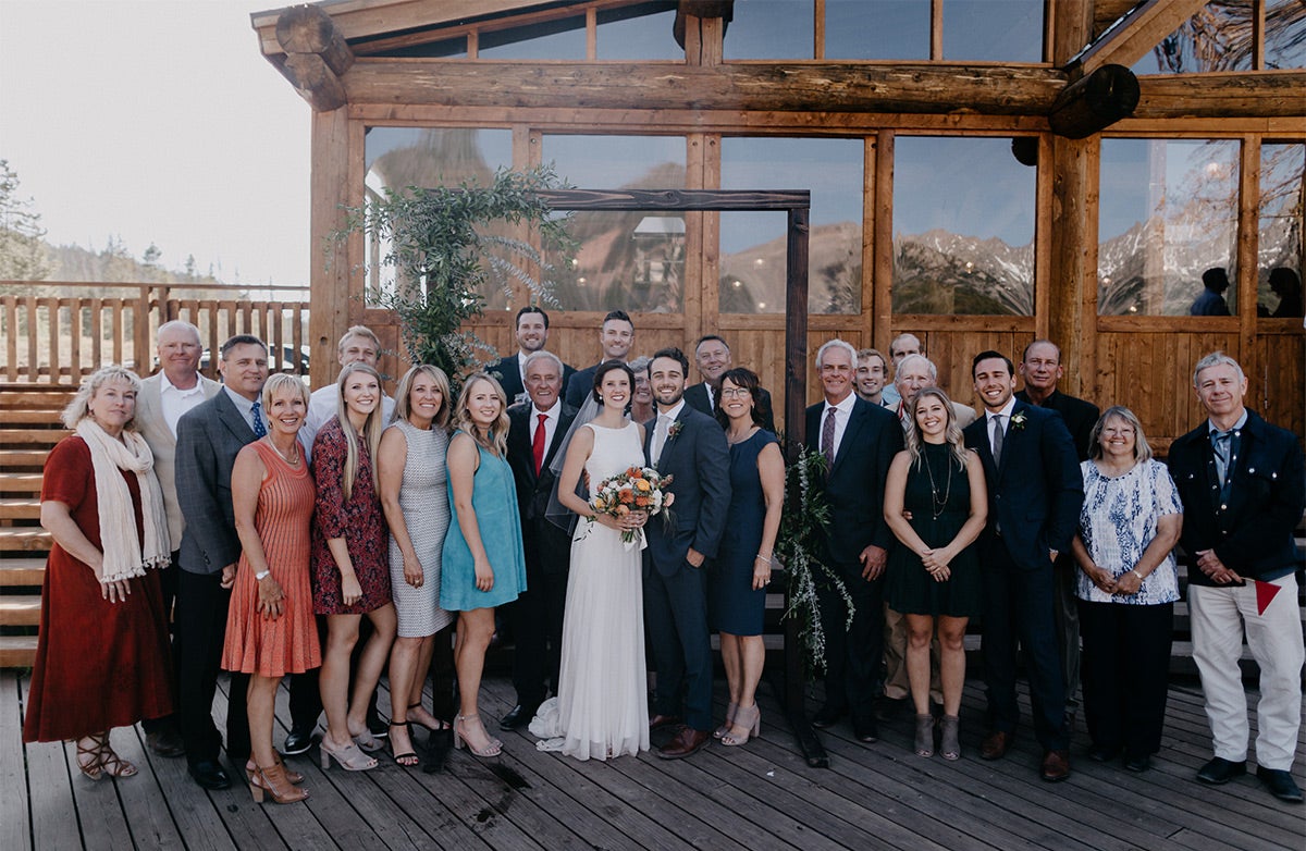 Full family portrait with bride and groom