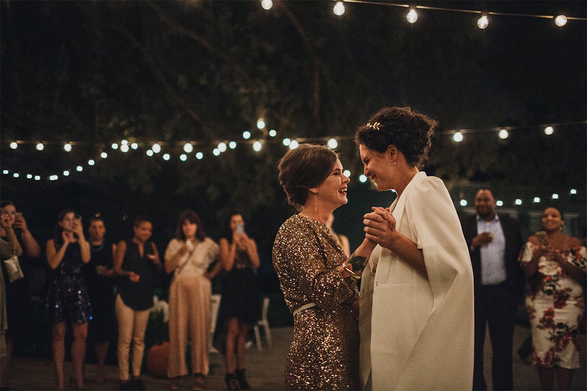 Newly married couple enjoying first dance