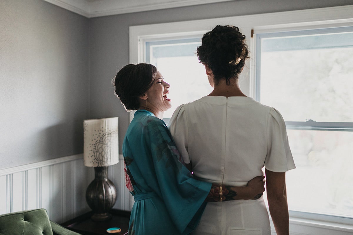 Bride and mom together before ceremony