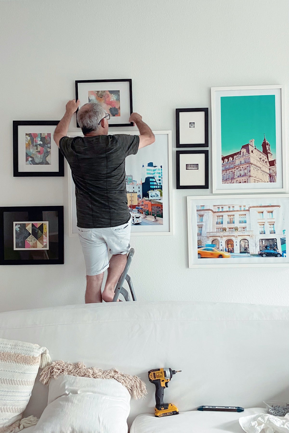 Artifact Uprising Gallery Frames on wall as part of a gallery wall mixing sizes, finishes, and spacing