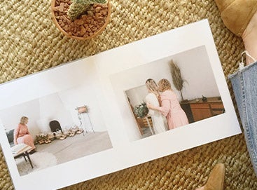 Wedding album opened to mother with daughter photos