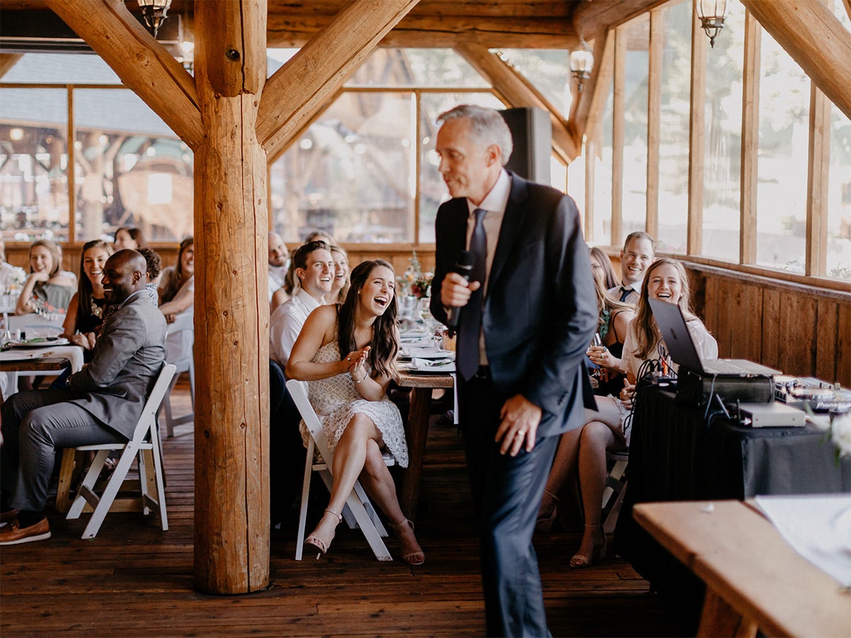 Father giving speech at wedding reception