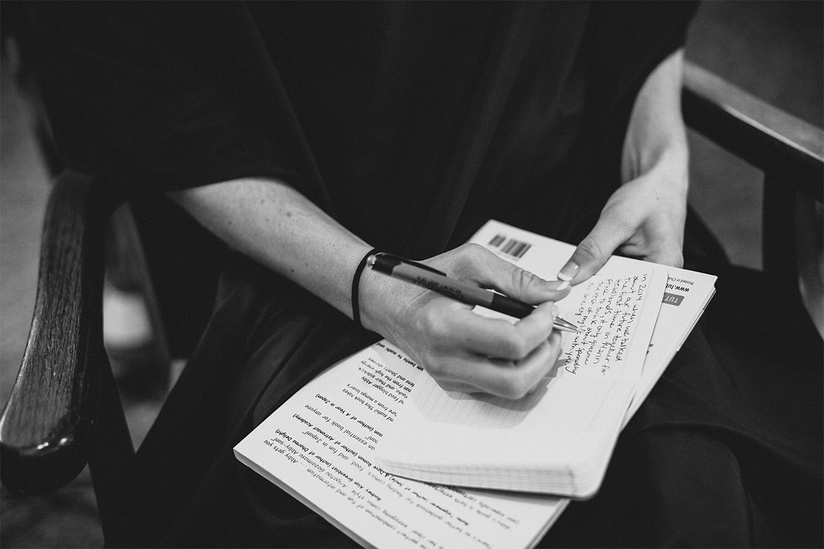 Woman writing her vows