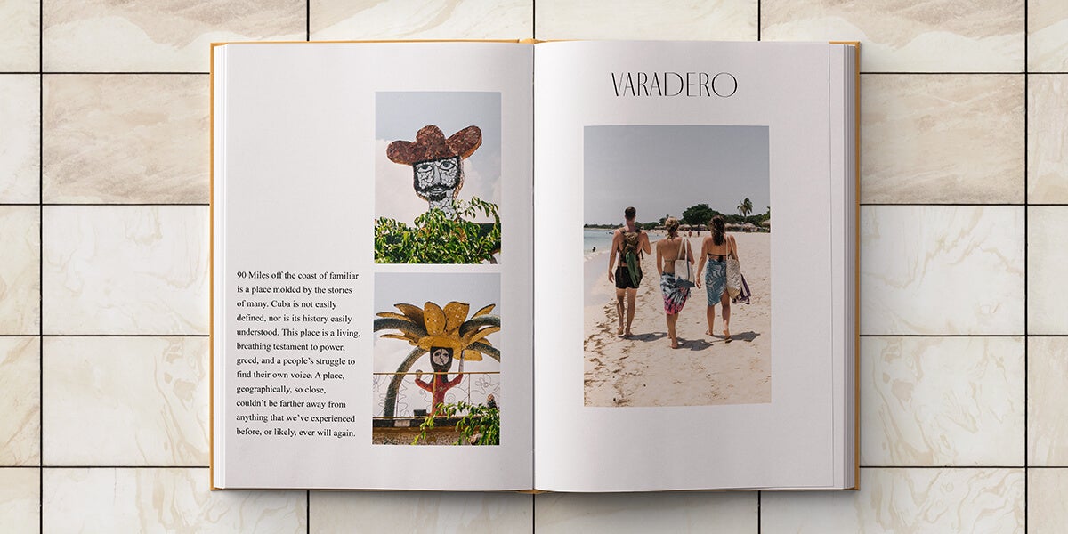 Cuba photo album opened to interior pages with text next to images