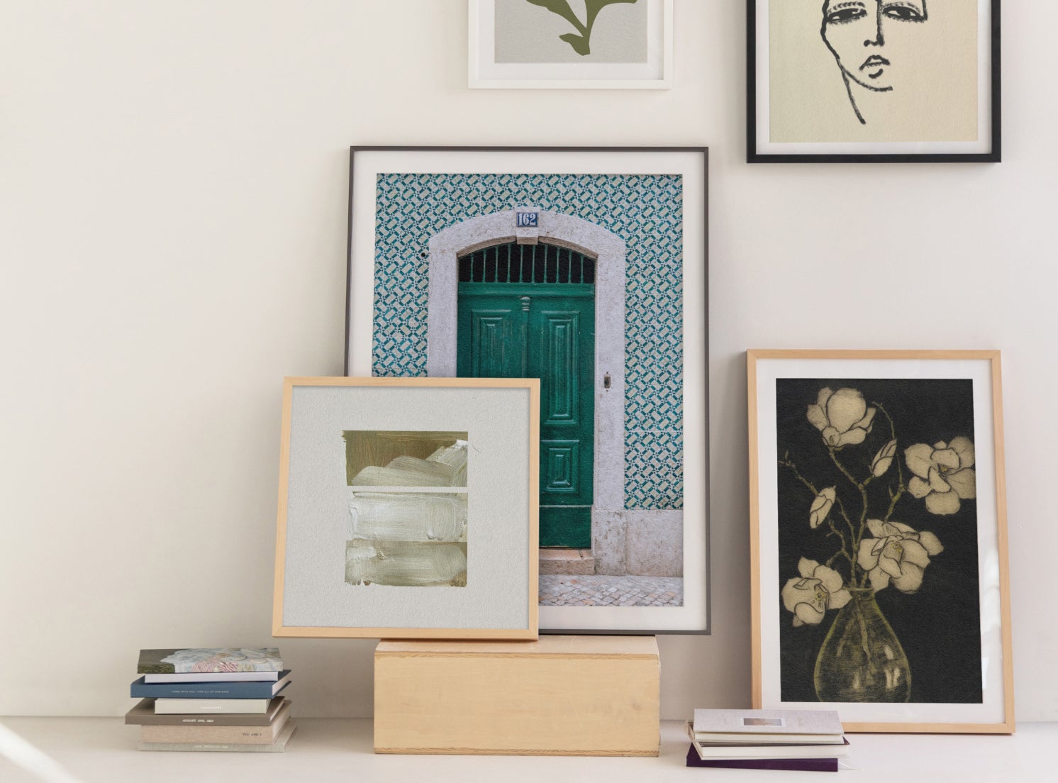 Beautifully modern, mismatched gallery wall featuring frames and downloadable art prints from Artifact Uprising