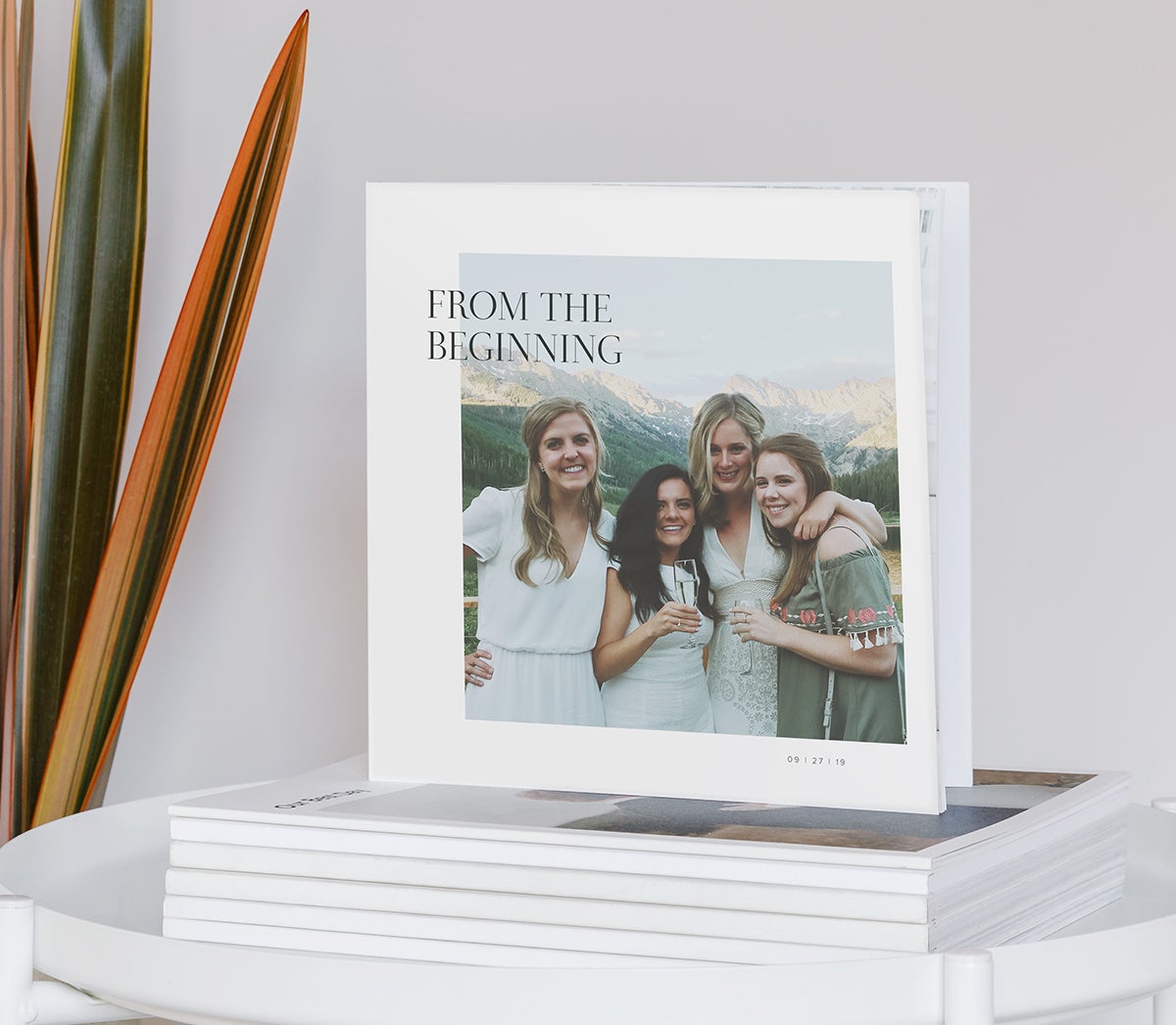 Softcover photo books used as guest books for each table